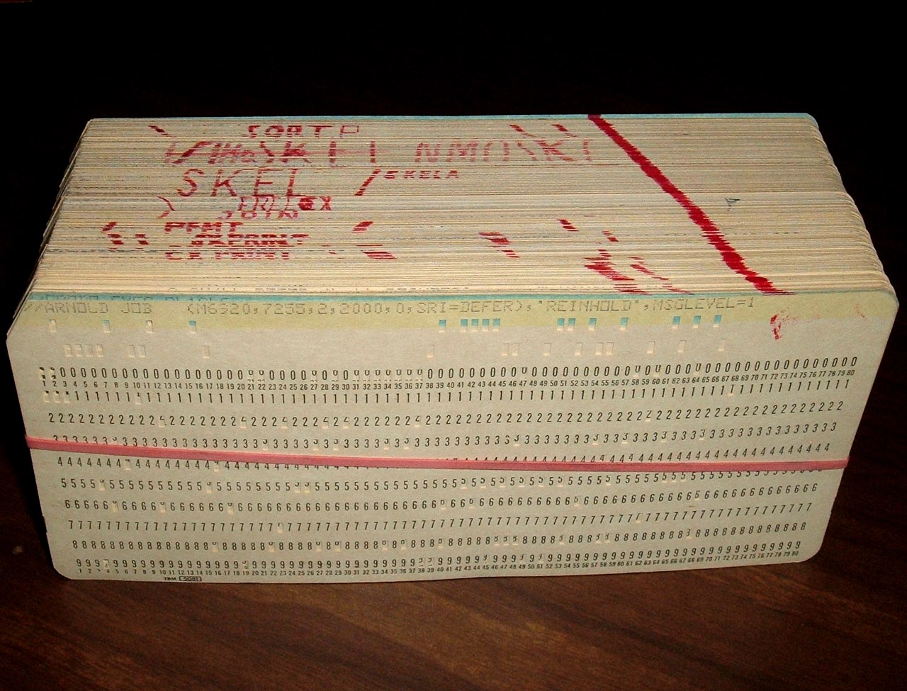 1280px-Punched_card_program_deck.agr.jpg